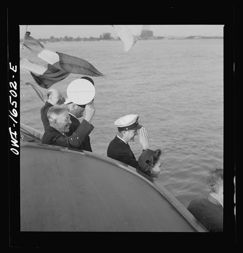Untitled photo, possibly related to: Detroit, Michigan. A Venetian night party at the Detroit yacht club, whose members represent the wealthier class of manufacturers and their friends. Reviewing the fleet