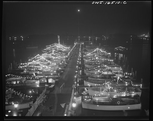 Detroit, Michigan. A Venetian night party at the Detroit yacht club, whose members represent the wealthier class of manufacturers and their friends. Cabin cruisers and sailboats decorated with lights