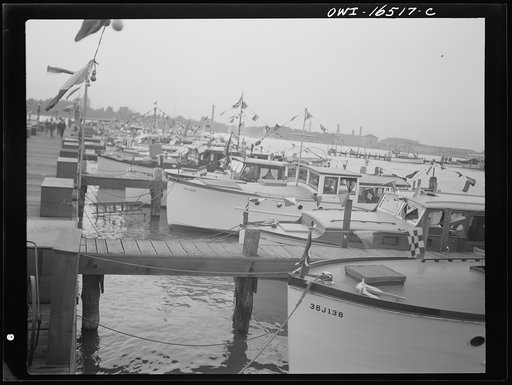 Untitled photo, possibly related to: Detroit, Michigan. A Venetian night party at the Detroit yacht club, whose members represent the wealthier class of manufacturers and their friends. Boats tied up at the club