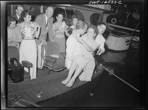 Untitled photo, possibly related to: Detroit, Michigan. A Venetian night part at the Detroit yacht club, whose members represent the wealthier class of manufacturers and their friends. Girl with clothing swimming