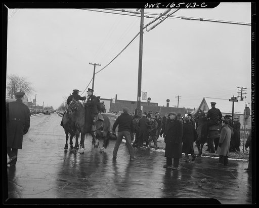 Detroit, Michigan. Riot at the Sojourner Truth homes, a new U.S. federal housing project, caused by white neighbors' attempt to prevent Negro tenants from moving in. Mounted police and whites