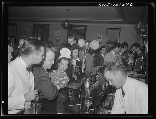 Untitled photo, possibly related to: Detroit, Michigan. A Venetian night party at the Detroit yacht club, whose members represent the wealthier class of manufacturers and their friends. Couple drinking at the bar