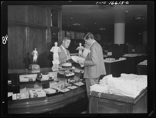 Detroit, Michigan. Buying men's shorts in the Crowley-Milner department store
