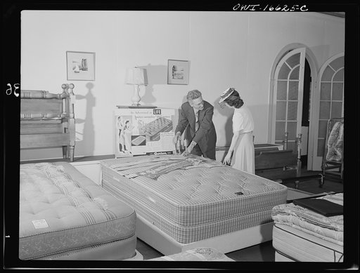 Detroit, Michigan. Selling mattresses at the Crowley-Milner department store