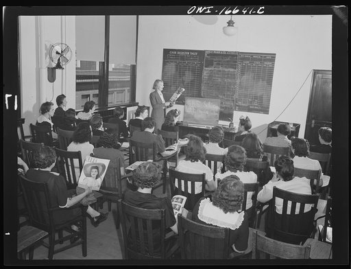 Untitled photo, possibly related to: Detroit, Michigan. Class for telephone operators at the Crowley-Milner department store