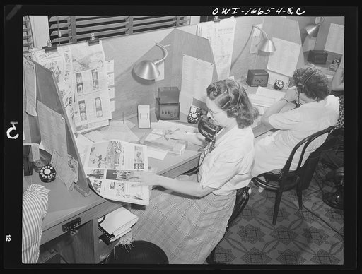Detroit, Michigan. Operator taking telephone orders at the Crowley-Milner department store