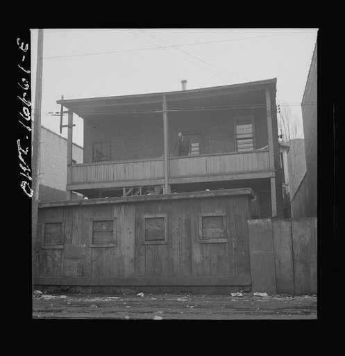Untitled photo, possibly related to: Detroit, Michigan. Back view of a Negro's home. These are conditions under which families originally lived before moving to the Sojourner Truth housing project
