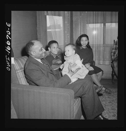 Untitled photo, possibly related to: Detroit, Michigan. A typical Negro worker's family. These are conditions under which families originally lived before moving to the Sojourner Truth housing project