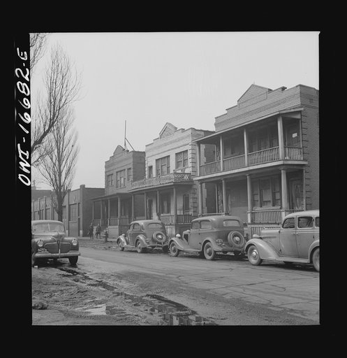 Untitled photo, possibly related to: Detroit, Michigan. Typical Negro residential fronts. These are conditions under which families originally lived before moving to the Sojourner Truth project