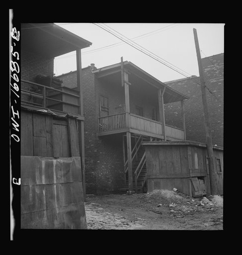 Untitled photo, possibly related to: Detroit, Michigan. Alley in a Negro neighborhood. These are conditions under which families originally lived before moving to the Sojourner Truth housing project