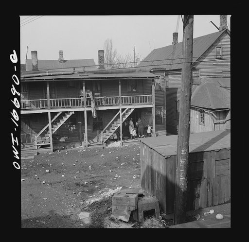 Untitled photo, possibly related to: Detroit, Michigan. Typical Negro residence. These are conditions under which families originally lived before moving to the Sojourner Truth housing project