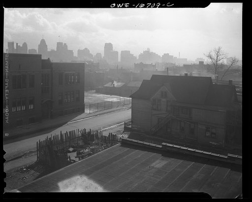 Untitled photo, possibly related to: Detroit, Michigan. Looking towards downtown from the slum area in the early morning. These are conditions under which families originally lived before moving to the Sojourner Truth housing project