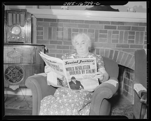 Royal Oak, Michigan. Elderly woman with a copy of Social justice saying "World revolution urdered by Stalin!"