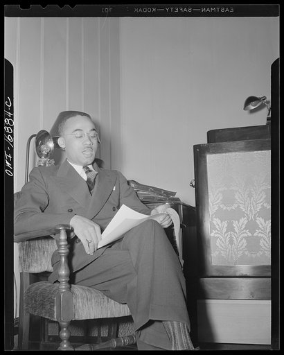Untitled photo, possibly related to: Orlando, Florida. Wings over Jordan, a popular Sunday morning radio program broadcast by Columbia Broadcasting System from station WDBO. President James A. Colston of Bethune-Cookman college speaking to a nationwide audience