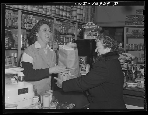 Blue Island, Illinois. Mrs. Senise shopping at the neighborhood grocery