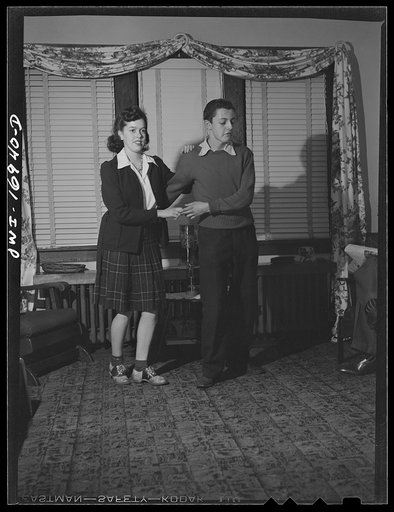 Untitled photo, possibly related to: Blue Island, Illinois. Before going out on a date, Jerry Senise and his friend Mary Lou Grubles dance awhile to the music of the radio