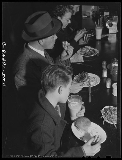Untitled photo, possibly related to: Blue Island, Illinois. After a movie, the Senise family drops in at a lunch counter for hamburgers