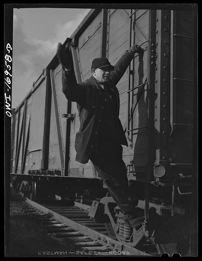 Untitled photo, possibly related to: Daniel Senise riding a car at work in an Indiana Harbor Belt Line railroad yard