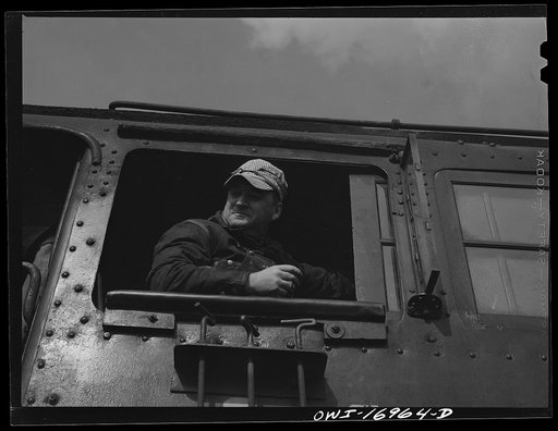 Engineer of a New York Central locomotive at an Indiana Harbor Belt Line railroad yard