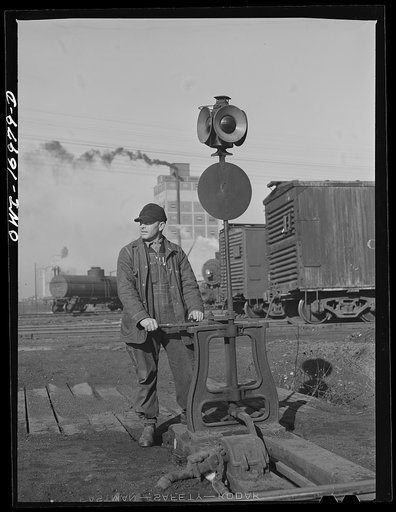 Daniel Senise throwing a switch at work in an Indiana Harbor Belt Line railroad yard
