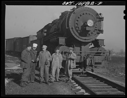 Untitled photo, possibly related to: Daniel Senise and his crew with their engine in an Indiana Harbor Belt Line railroad yard. Left to right: Daniel Senise, switchman, conductor and foreman; Edward Kletecka, fireman; F.K. Gwinner, engineer; E.H. Albercht, switchman and John McCarthy, switchman