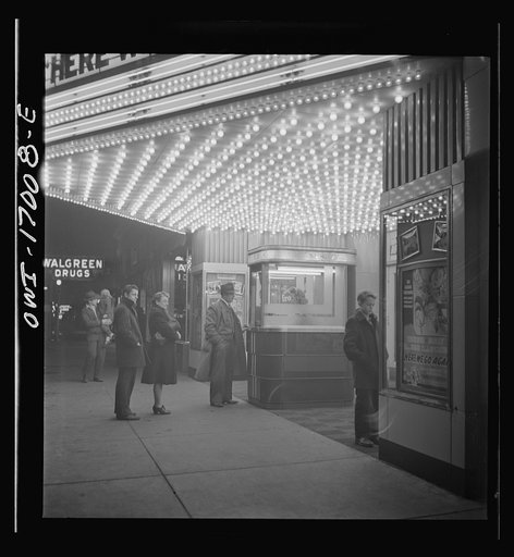 Untitled photo, possibly related to: Blue Island, Illinois. The Senise family going to the movies