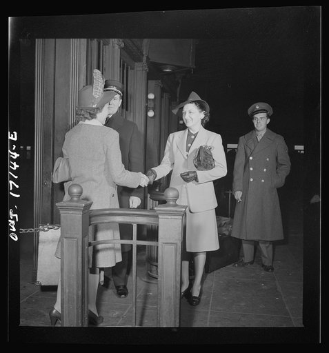Untitled photo, possibly related to: Wahington, D.C. Mrs. St. Ayr greeting a new girl employee of the U.S. government at the station