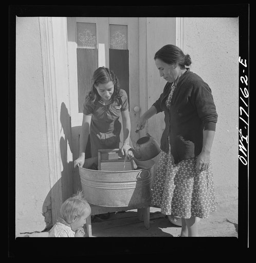 Trampas. New Mexico. The wife and daughter of Juan Lopez, the majordomo (mayor) [i.e., steward], doing the family washing. Water is precious; it must be carried a quarter of a mile from the river