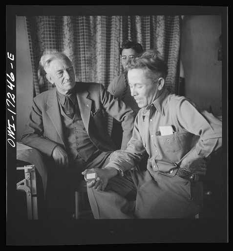 Untitled photo, possibly related to: Penasco, New Mexico. Doctor Onstine, medical doctor, making an examination in the clinic operated by the Taos County cooperative health association