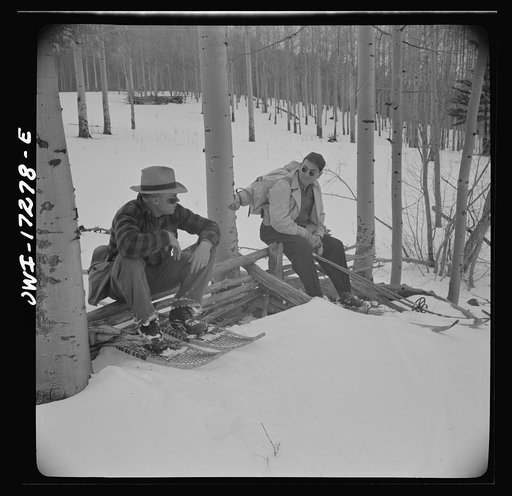 Rangers going to measure snow on the Sangre de Cristo Mountains above Penasco, New Mexico