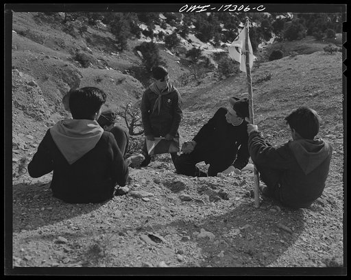 Penasco, New Mexico. Father Cassidy instructing his Boy Scout troop in geology