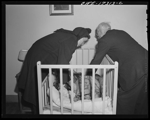 Taos, New Mexico. Doctor Onstine making an examination of a little girl who is dying of appendicitis, before an operation in Holy Cross Hospital