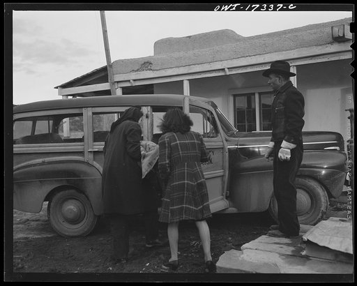 Penasco, New Mexico. Rushing a little girl who is dying of appendicitis to the hospital in Taos