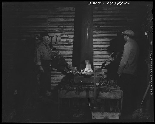 Untitled photo, possibly related to: Penasco, New Mexico. Blacksmith shop