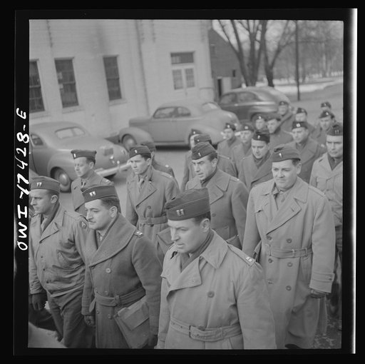 Untitled photo, possibly related to: Carlisle, Pennsylvania. U.S. Army medical field service school. Army doctors walking to classes after lunch. These doctors are taken from civilian life for a five-week course in how the Army, and particularly the medical corps, functions before going into active 