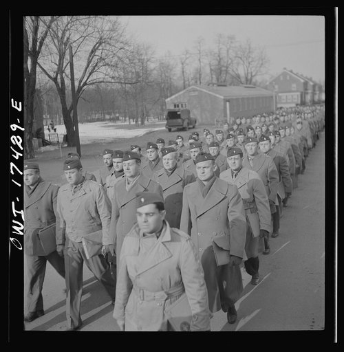 Carlisle, Pennsylvania. U.S. Army medical field service school. Army doctors walking to classes after lunch. These doctors are taken from civilian life for a five-week course in how the Army, and particularly the medical corps, functions before going into active service. Their ranks range from first