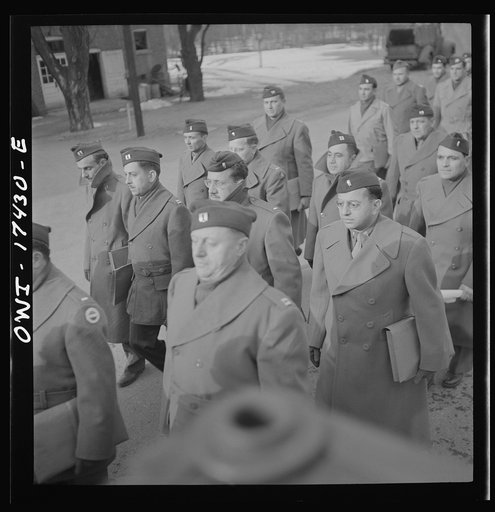 Untitled photo, possibly related to: Carlisle, Pennsylvania. U.S. Army medical field service school. Army doctors walking to classes after lunch. These doctors are taken from civilian life for a five-week course in how the Army, and particularly the medical corps, functions before going into active 