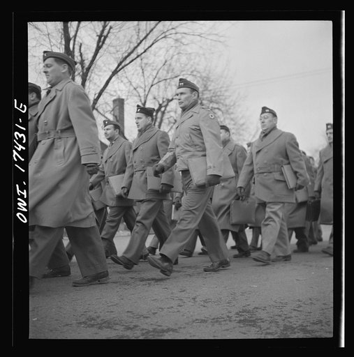 Carlisle, Pennsylvania. U.S. Army medical field service school. Army doctors walking to classes after lunch. These doctors are taken from civilian life for a five-week course in how the Army, and particularly the medical corps, functions before going into active service. Their ranks range from first