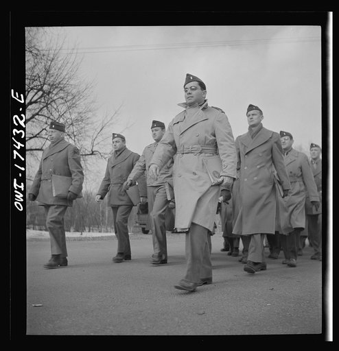 Carlisle, Pennsylvania. U.S. Army medical field service school. Army doctors walking to classes after lunch. These doctors are taken from civilian life for a five-week course in how the Army, and particularly the medical corps, functions before going into active service. Their ranks range from first