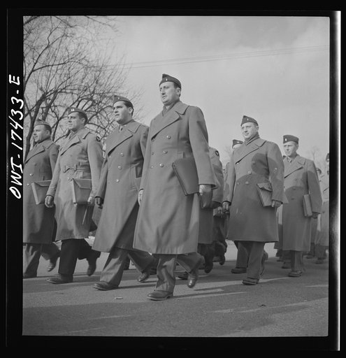 Carlisle, Pennsylvania. U.S. Army medical field service school. Army doctors walking to classes after lunch. These doctors are taken from civilian life for a five-week course in how the Army, and particularly the medical corps, functions before going into active service. Their ranks range from first