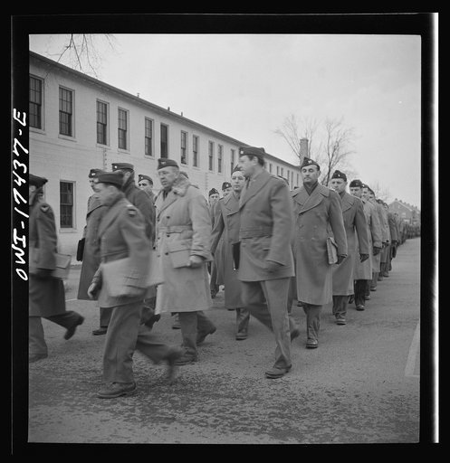Untitled photo, possibly related to: Carlisle, Pennsylvania. U.S. Army medical field service school. Army doctors walking to classes after lunch. These doctors are taken from civilian life for a five-week course in how the Army, and particularly the Medical corps, functions before going into active 