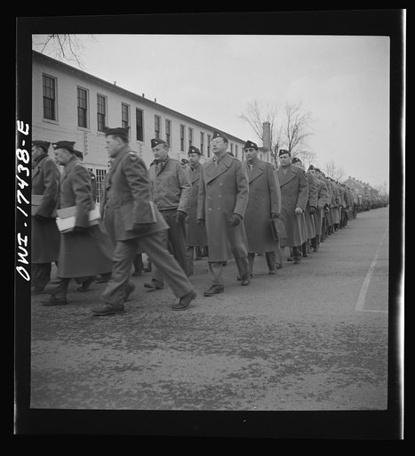 Untitled photo, possibly related to: Carlisle, Pennsylvania. U.S. Army medical field service school. Army doctors walking to classes after lunch. These doctors are taken from civilian life for a five-week course in how the Army, and particularly the Medical corps, functions before going into active 