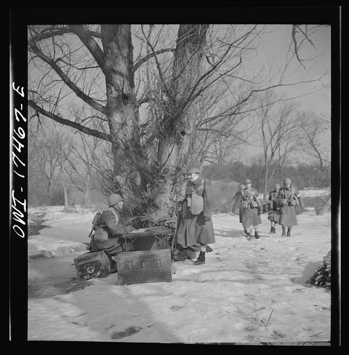 Carlisle, Pennsylvania. Demonstration before Army doctors and officer candidates at the U.S. Army medical field service school. "Wounded" soldiers who are brought into the collecting station are registered by a sergeant