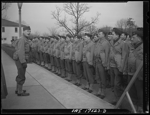 Carlisle, Pennsylvania. U.S. Army medical field service school. Before starting on their first road march, Army doctors are given a talk by a major who tells them how to disperse singly to side of road in case of bombing. If they stay together, they make too good a target