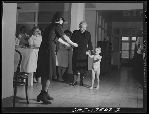 Minneapolis, Minnesota. Johnny Weaver was mildly stricken by infantile paralysis and was at the Elizabeth Kenny Institute from October 9th, 1942 to November 26th, 1943. Here he shows student technicians and his mother how well he can walk