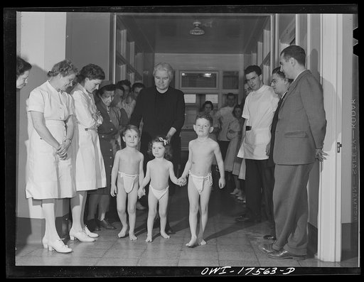 Minneapolis, Minnesota. The Elizabeth Kenny treatment brings recovery in eighty percent of the infantile paralysis cases admitted to her institute. Here are three of them: Left, Johnny Weaver, center, Winifred Gorman, and Marvin Goldstein