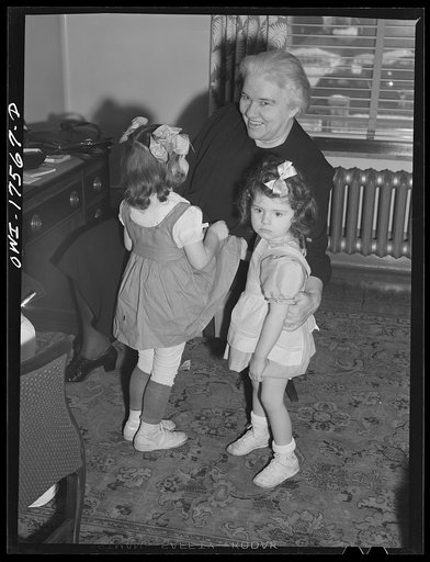 Minneapolis, Minnesota. Sister Kenny with Winifred Gorman (right), an infantile paralysis patient, and Winifred's sister who has come to the Elizabeth Kenny Institute to see her on visitor's day