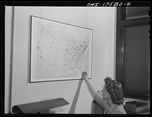 Minneapolis, Minnesota. Another pin goes into the map showing location of doctors and technicians qualified by the Elizabeth Kenny Institute throughout the country. The pin in the lower left hand corner is for Hawaii. There is also one doctor each in Puerto Rico and Cuba
