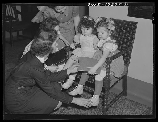 Minneapolis, Minnesota. Winifred and Kathelene Gorman at the Kenny Institute. Winifred is an infantile paralysis patient and is being visited by her sister