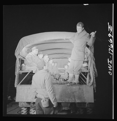 Untitled photo, possibly related to: Carlisle, Pennsylvania. U.S. Army medical field service school. Commanding officer giving instructions to a doctor who is starting on his night problem